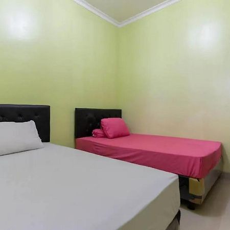 Готель Kostawira Syariah Bintaro Mitra Reddoorz Mencil Екстер'єр фото