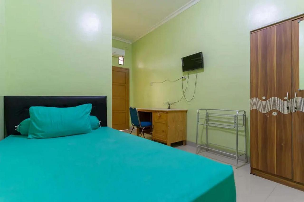 Готель Kostawira Syariah Bintaro Mitra Reddoorz Mencil Екстер'єр фото